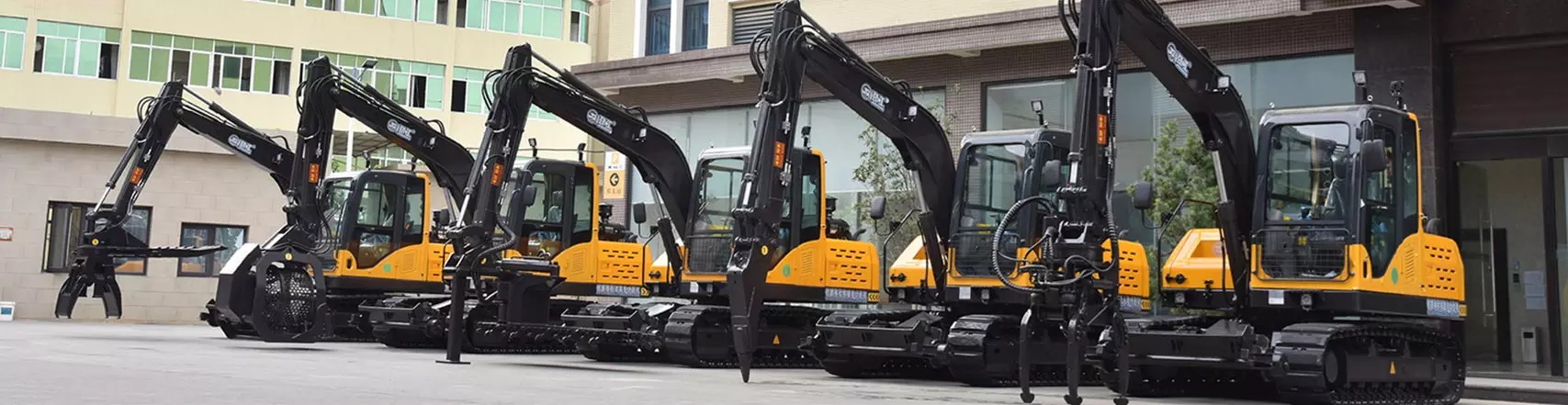 Hirail excavator with material leveler